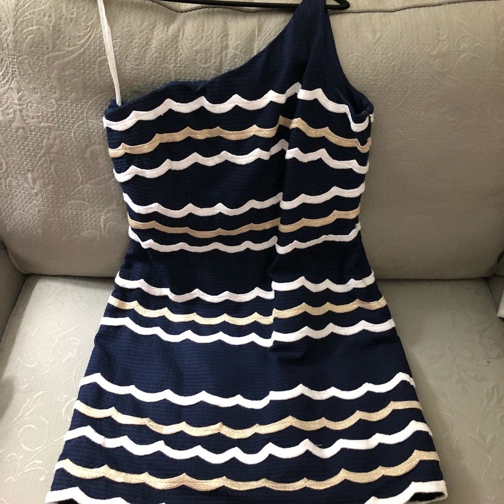 Lilly one shoulder dress with scalloped hem.